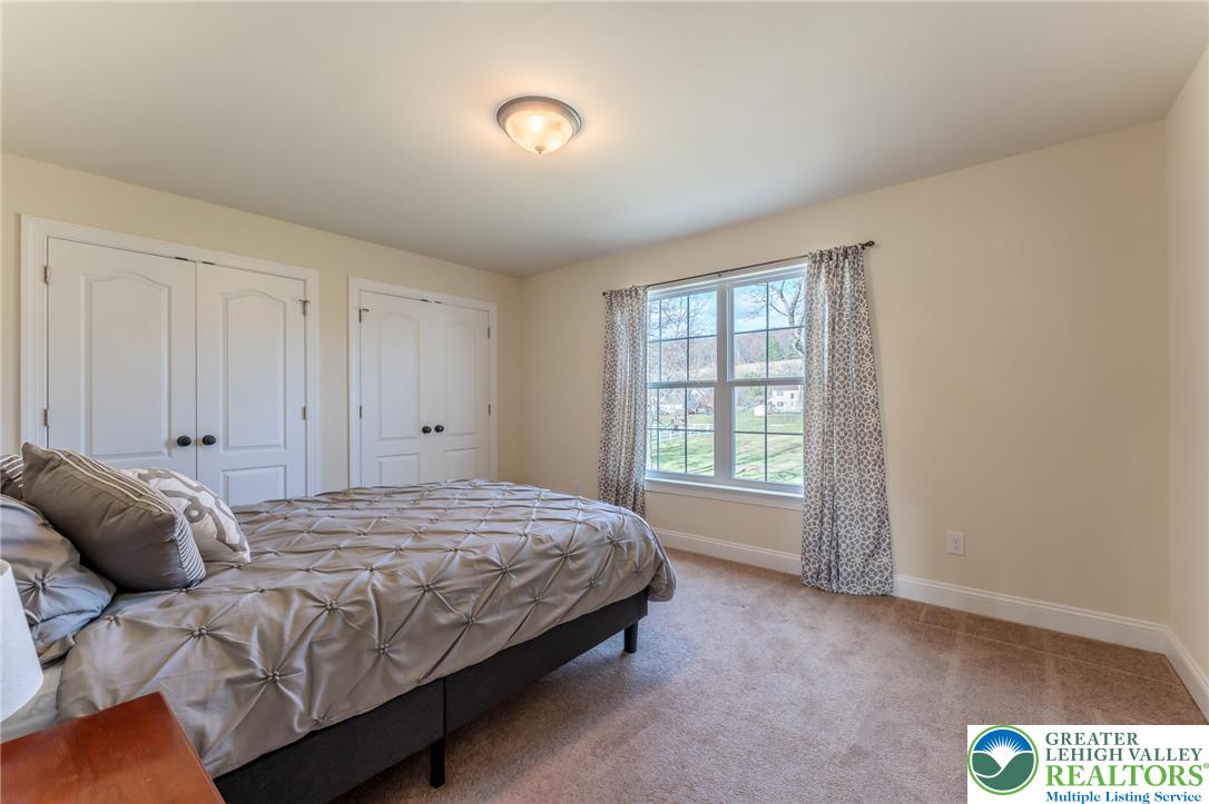 3505 Woodbyne Road Hellertown, PA 18055 - Photo 35 of 66 a bedroom with a bed and a window