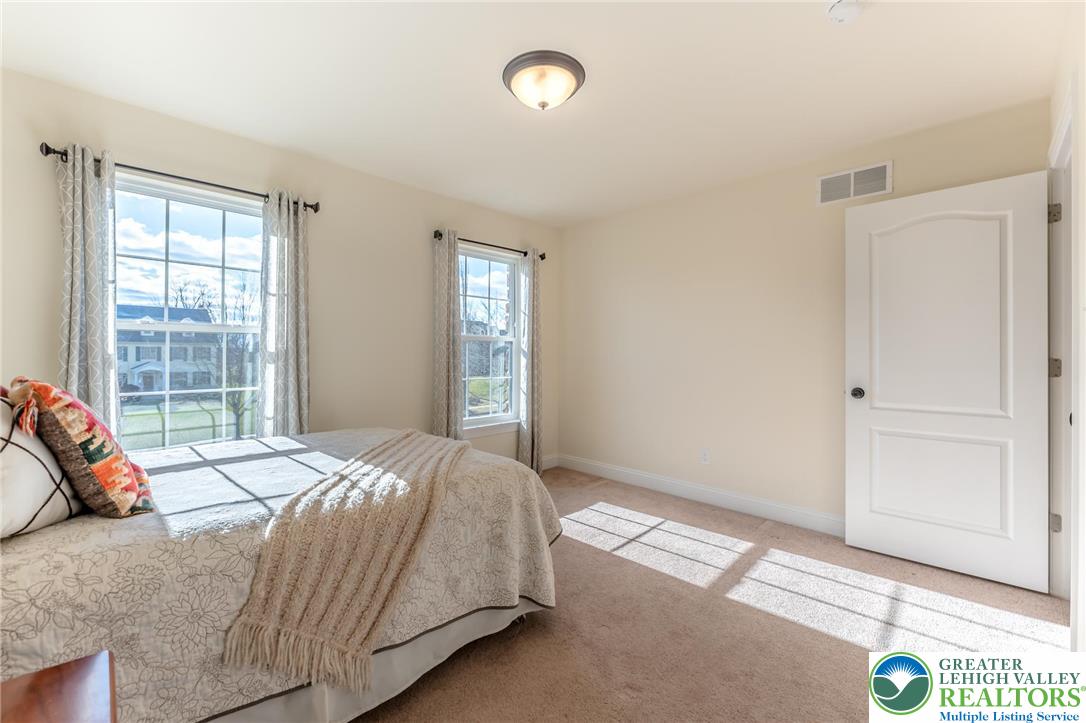 3505 Woodbyne Road Hellertown, PA 18055 - Photo 40 of 66 a bedroom with a bed and a window