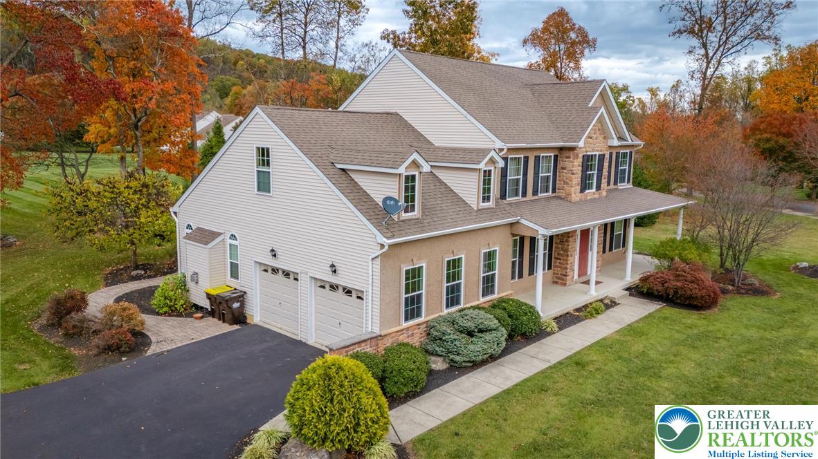 3505 Woodbyne Road Hellertown, PA 18055 - Photo 42 of 66 front view of a house with a yard