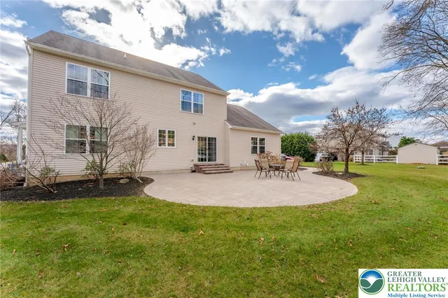 a front view of house with garden