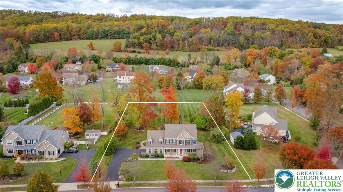 3505 Woodbyne Road Hellertown, PA 18055 - Photo 51 of 66 an aerial view of houses with a lake