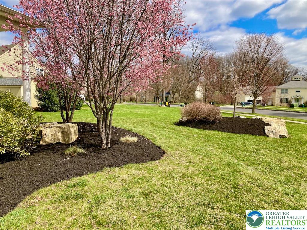 3505 Woodbyne Road Hellertown, PA 18055 - Photo 56 of 66 a view of a garden with a tree