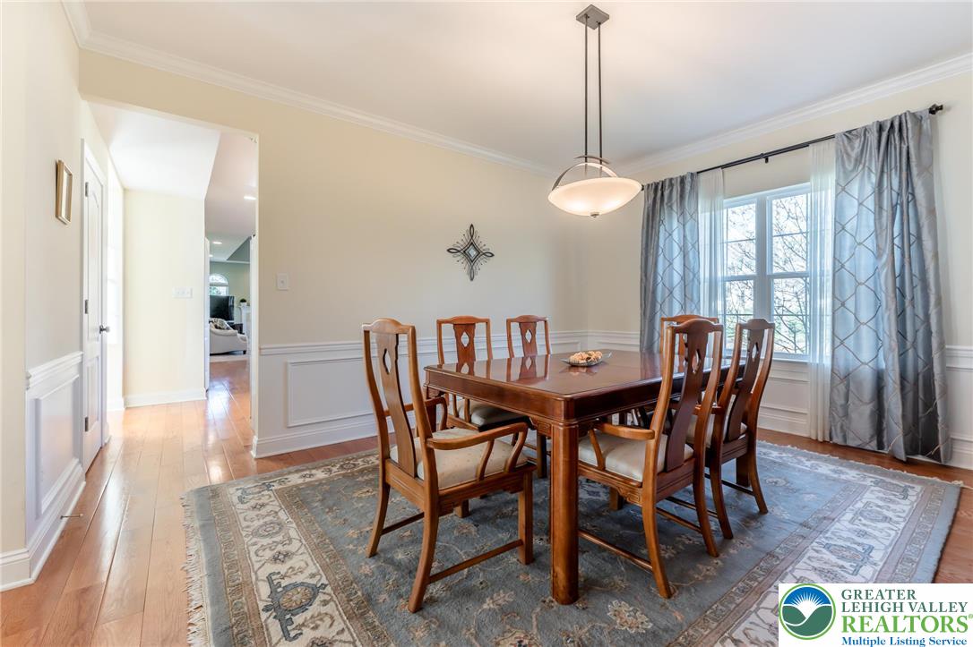 3505 Woodbyne Road Hellertown, PA 18055 - Photo 10 of 66 a dining room with furniture window and wooden floor