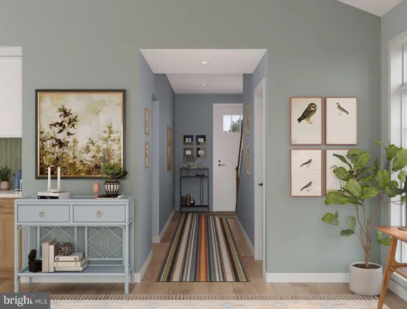 a view of a hallway with paintings on the wall