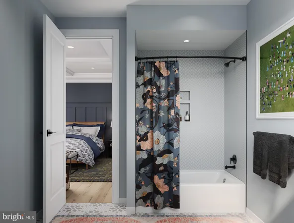 a bathroom with a tub and shower