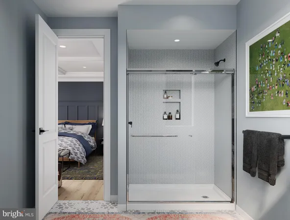 a bathroom with a glass shower door