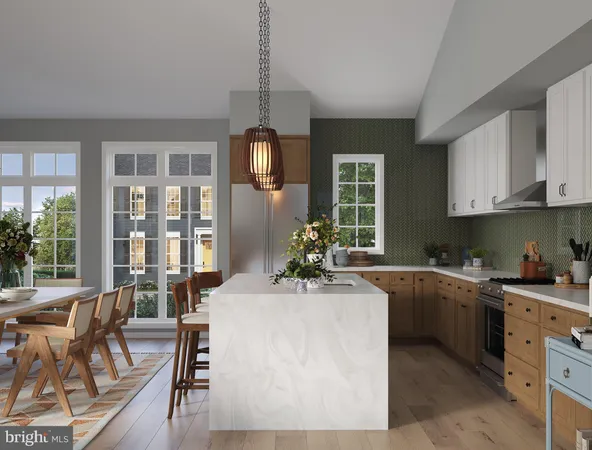a kitchen with stainless steel appliances kitchen island granite countertop a sink and cabinets