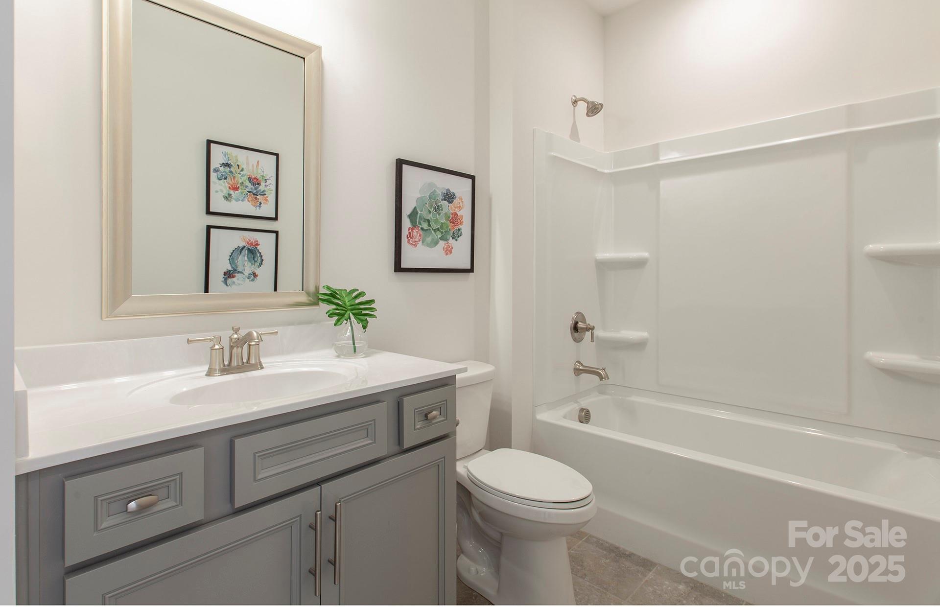 4715 Formation Court, Unit 47 Lancaster, SC 29720 - Photo 8 of 14 a bathroom with a sink a toilet and shower