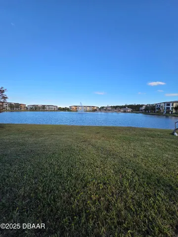a view of an ocean and city