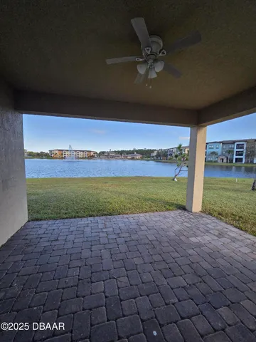 a view of a swimming pool and an outdoor space