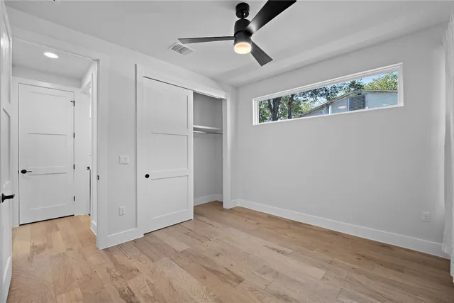 a bathroom with a sink toilet and mirror