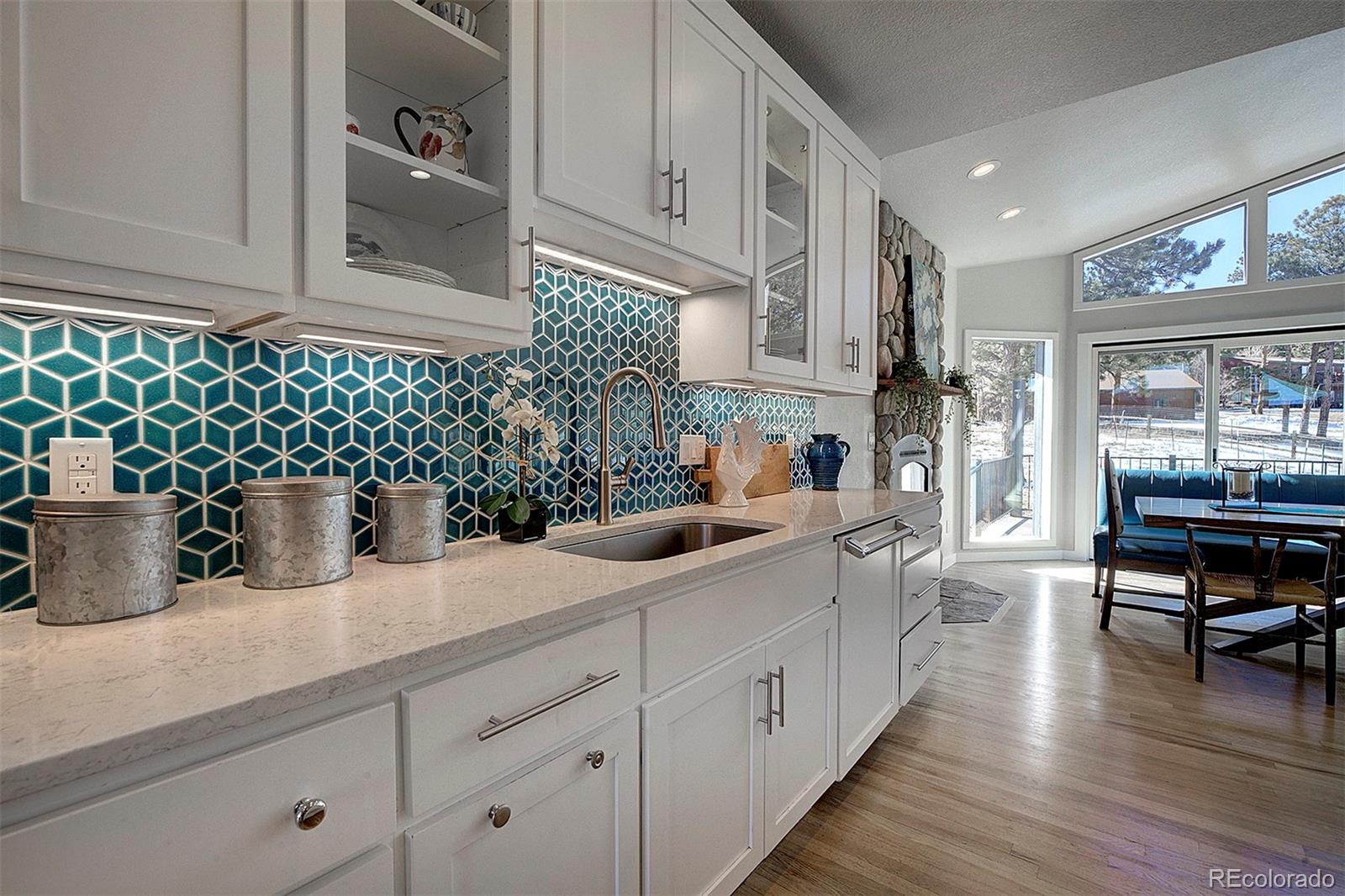 5371 Hazel Road Evergreen, CO 80439 - Photo 11 of 47 a kitchen with sink and cabinets