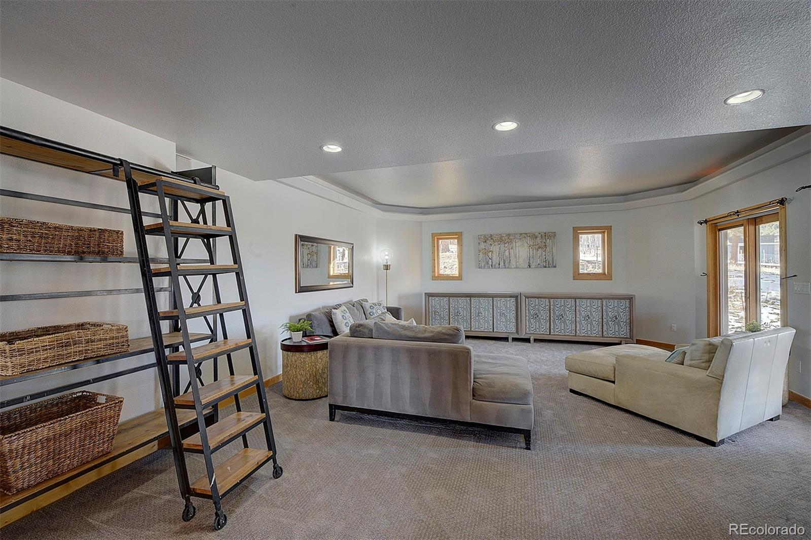 5371 Hazel Road Evergreen, CO 80439 - Photo 40 of 47 a living room with furniture and a window