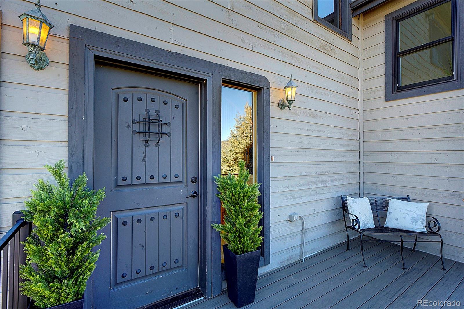 5371 Hazel Road Evergreen, CO 80439 - Photo 5 of 47 a view of a house with a porch and furniture