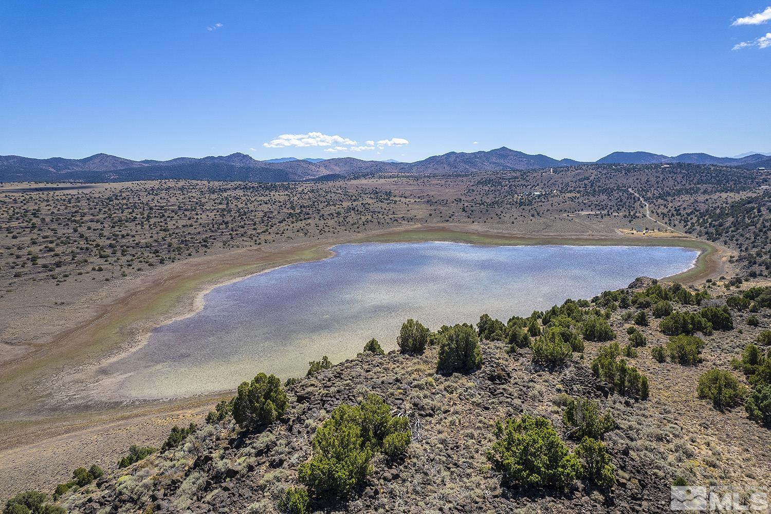 3510 Dry Lake Road, Unit 351 Reno, NV 89521 - Photo 1 of 13 a view of lake and mountain
