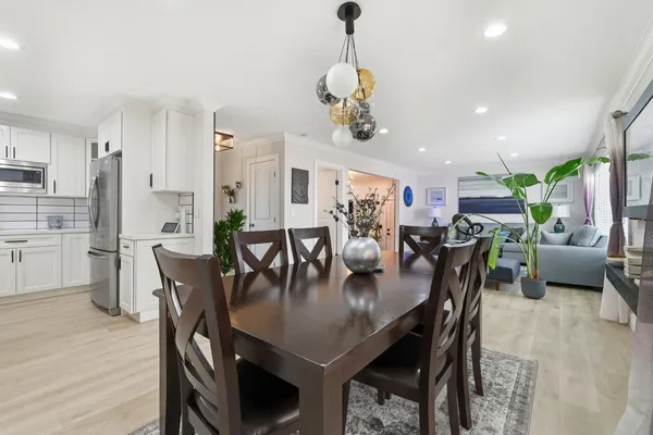 a view of a dining room with furniture