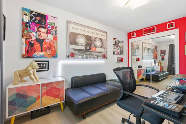 a living room with furniture and a window