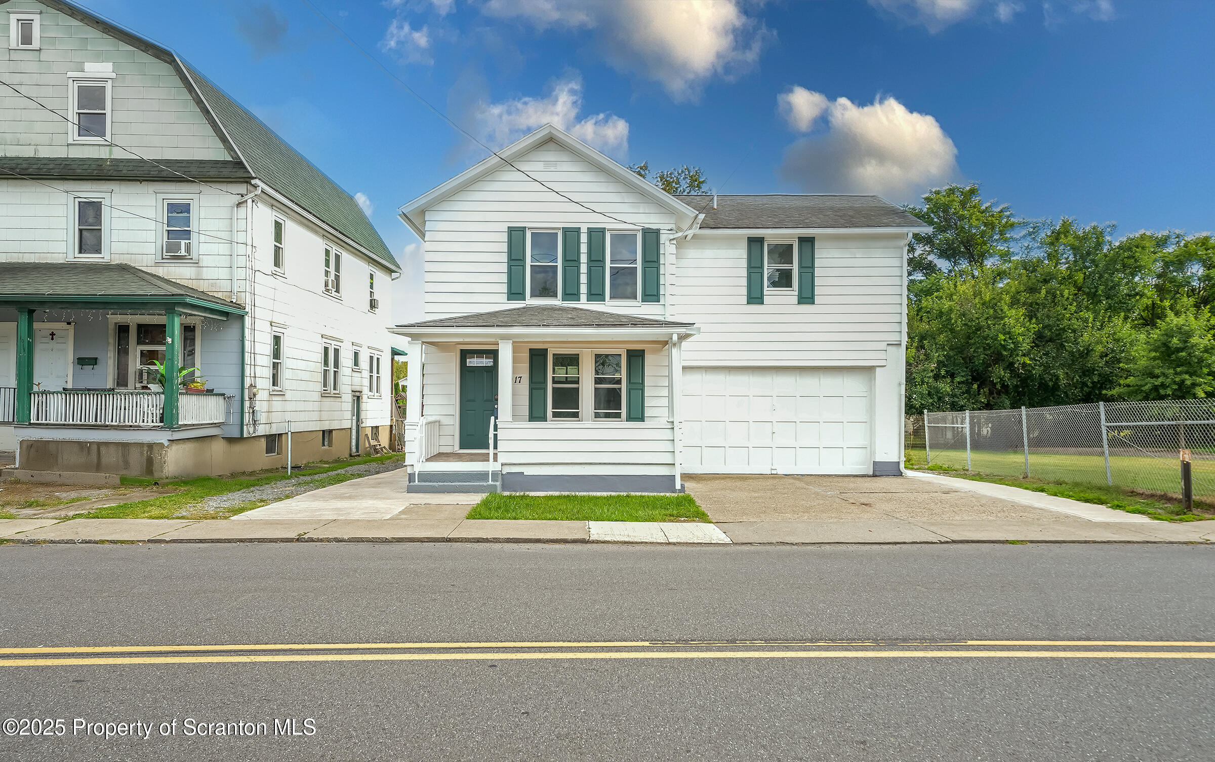 1017 Rutter Avenue Kingston, PA 18704 - Photo 1 of 36 a view of house with swimming pool and a yard