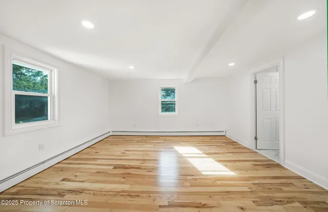 a view of a room with a staircase