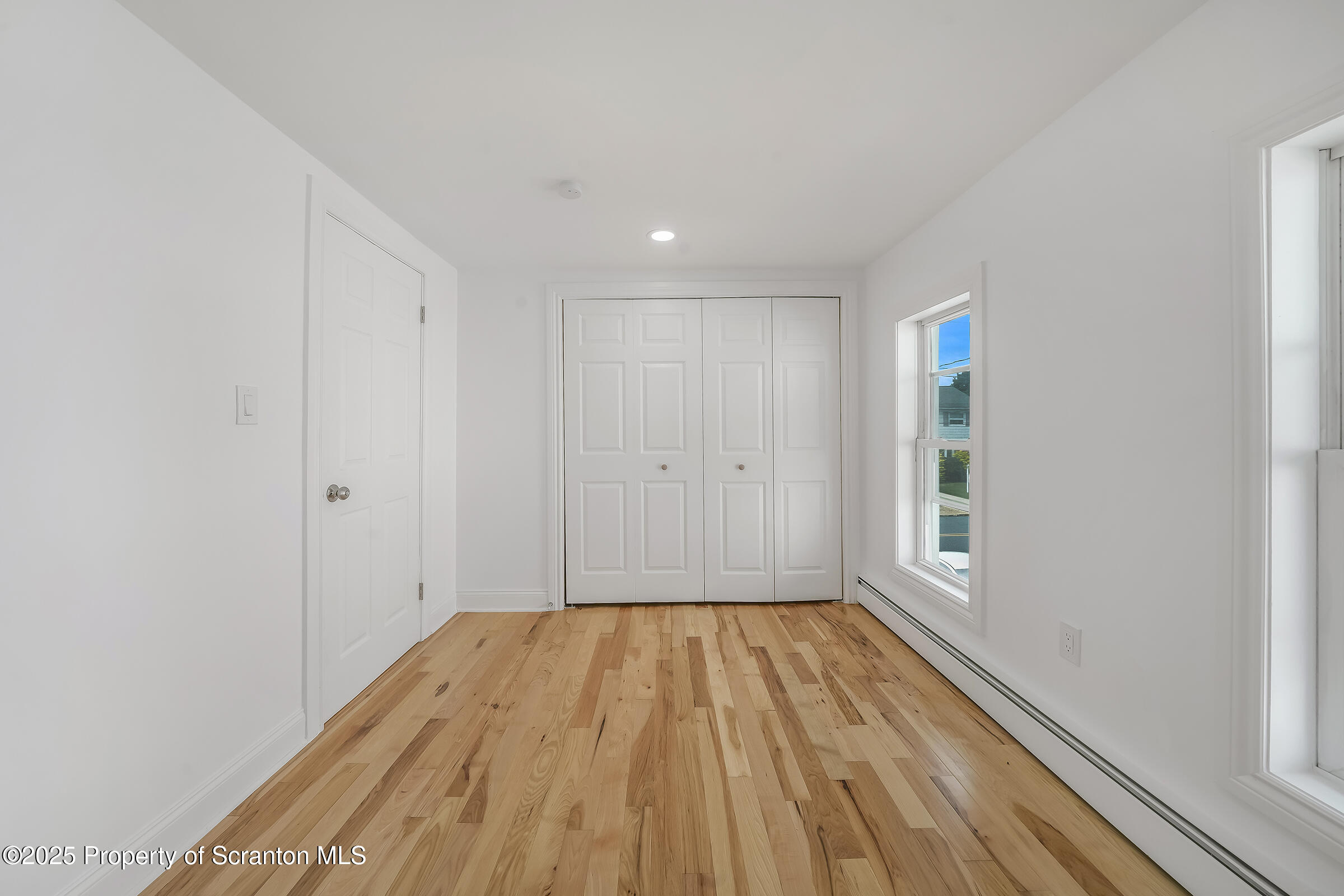 1017 Rutter Avenue Kingston, PA 18704 - Photo 24 of 36 a view of wooden floor in an empty room