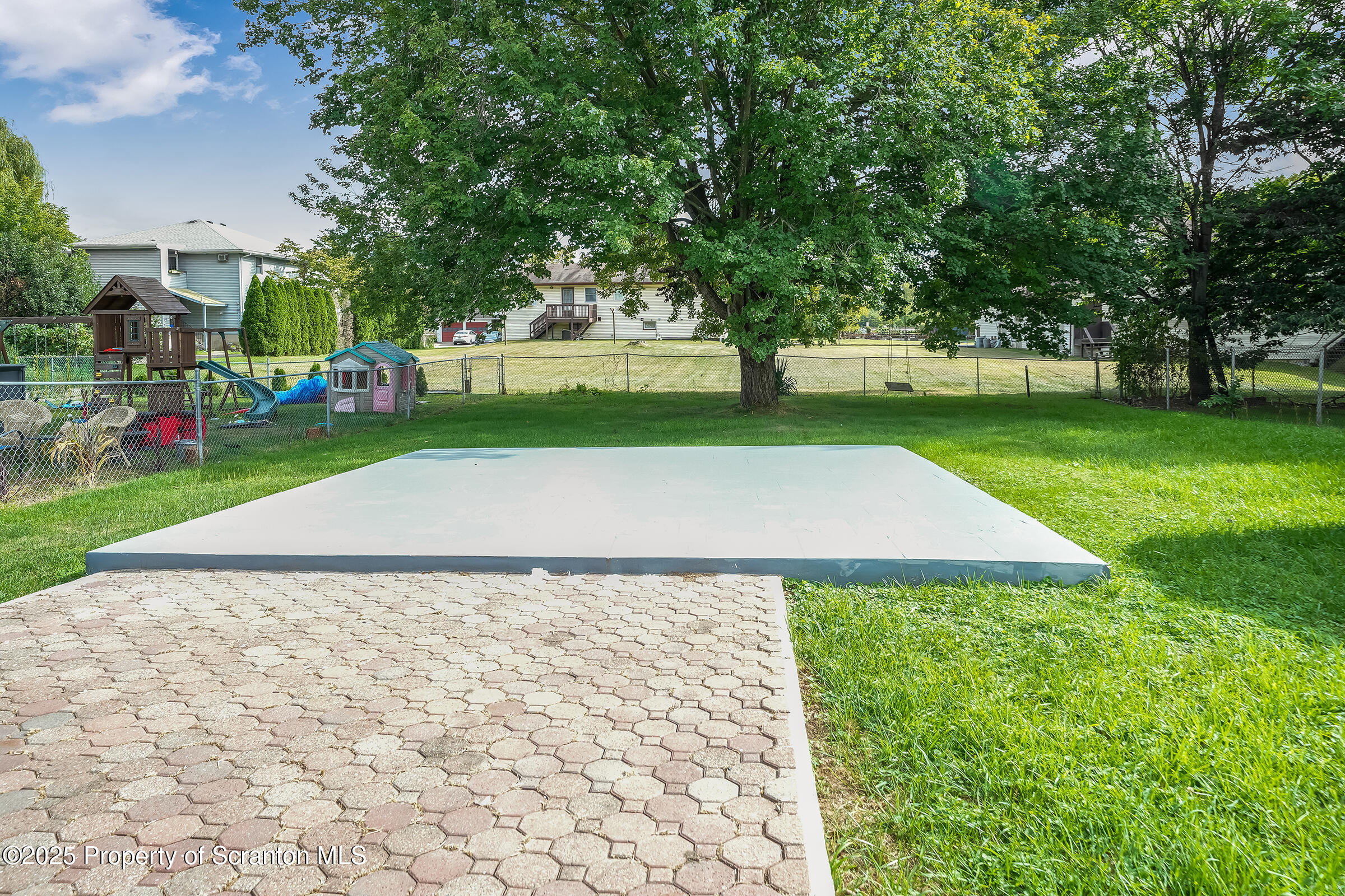 1017 Rutter Avenue Kingston, PA 18704 - Photo 7 of 36 a view of a yard with plants and trees