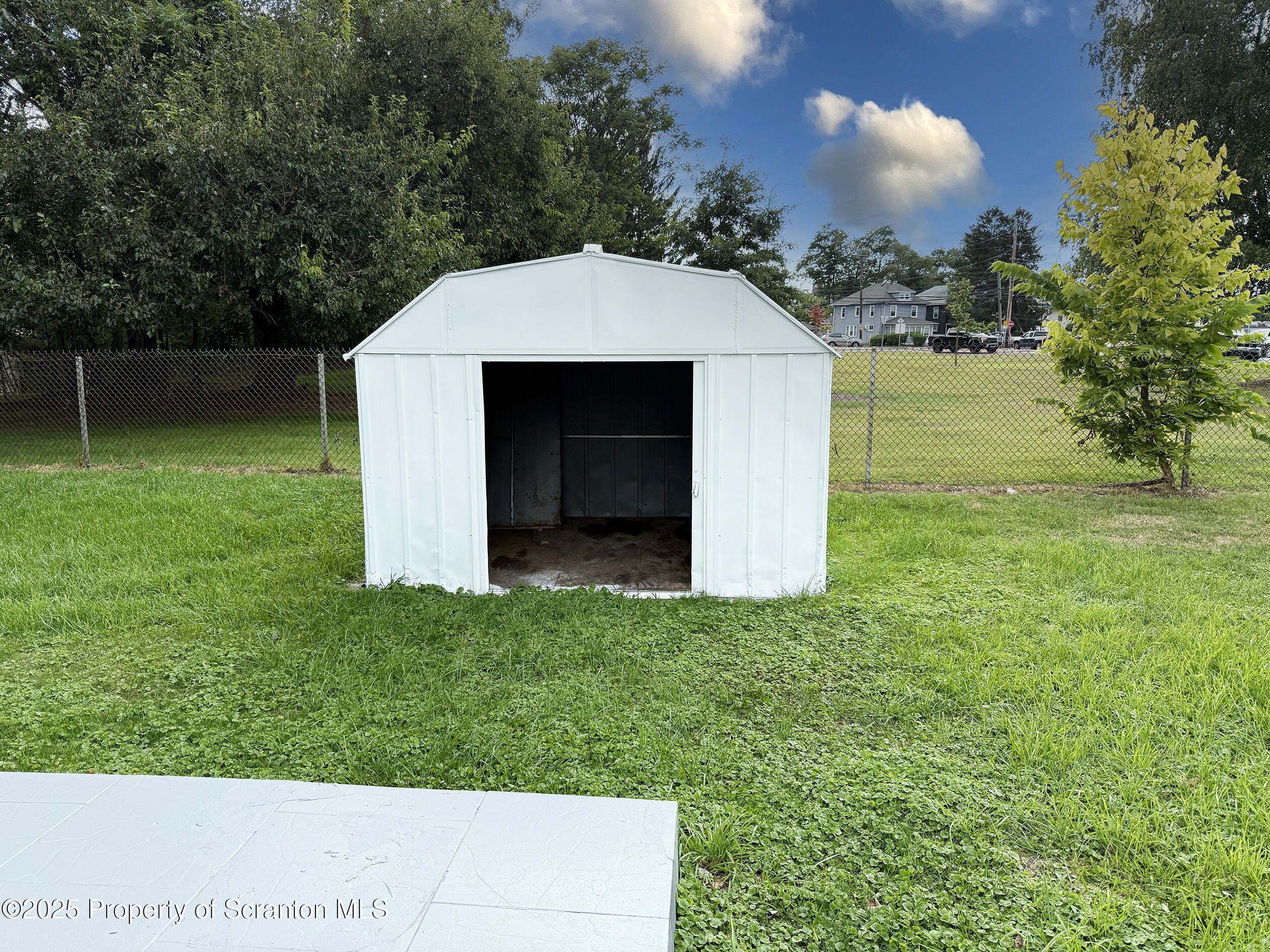 1017 Rutter Avenue Kingston, PA 18704 - Photo 8 of 36 a view of a backyard with a garden