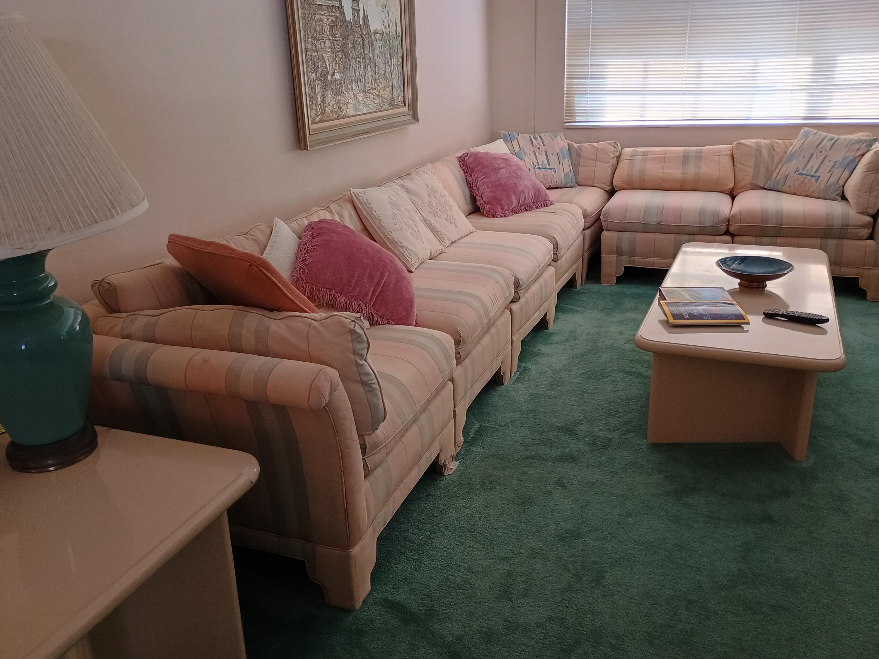 5505 North Ocean Boulevard, Unit 6206 Ocean Ridge, FL 33435 - Photo 15 of 25 a living room with furniture and a window
