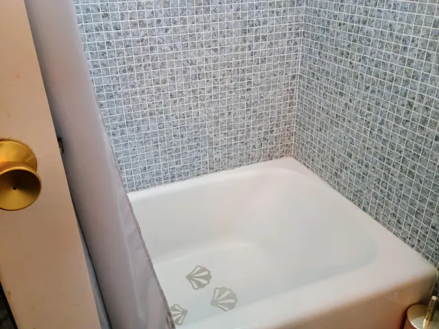 a bathroom with a bathtub