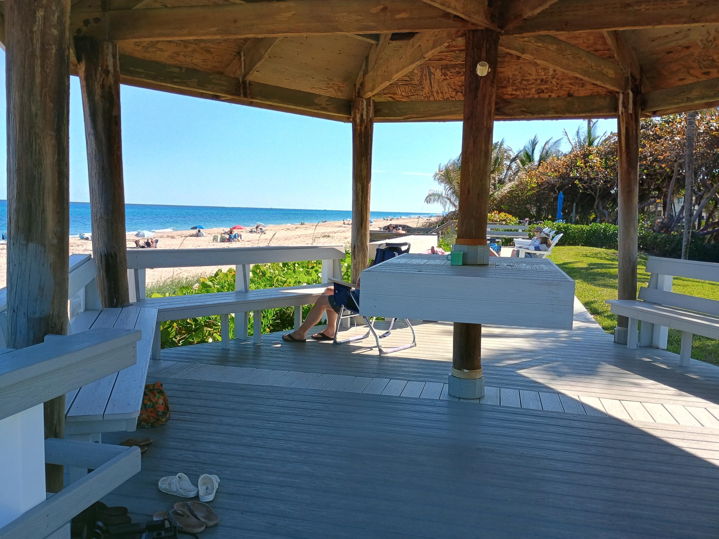 5505 North Ocean Boulevard, Unit 6206 Ocean Ridge, FL 33435 - Photo 5 of 25 a view of swimming pool with a patio and a yard