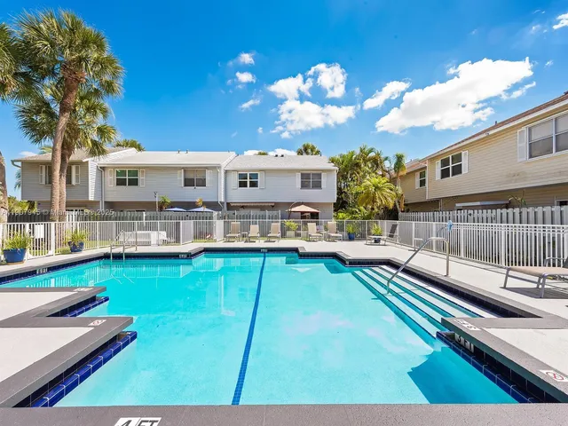 a view of a house with swimming pool