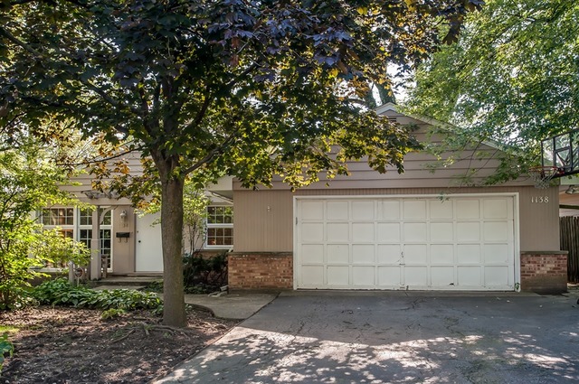 1138 Dell Road Northbrook, IL 60062 - Photo 1 of 16 a view of a house with a tree