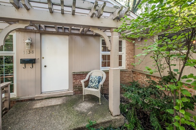 1138 Dell Road Northbrook, IL 60062 - Photo 2 of 16 a view of a chair and table in front of house