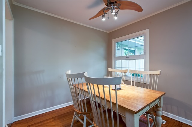 1138 Dell Road Northbrook, IL 60062 - Photo 6 of 16 a view of a dining room with furniture window and wooden floor