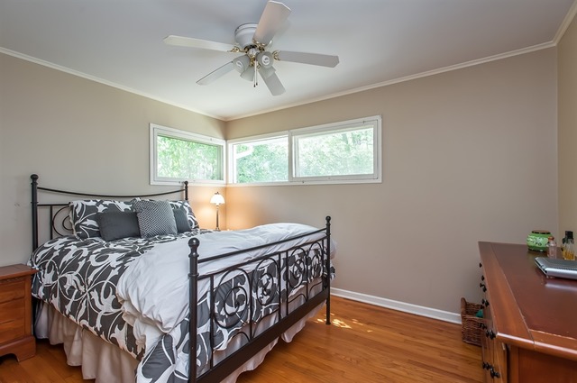 1138 Dell Road Northbrook, IL 60062 - Photo 8 of 16 a bedroom with a bed and a window