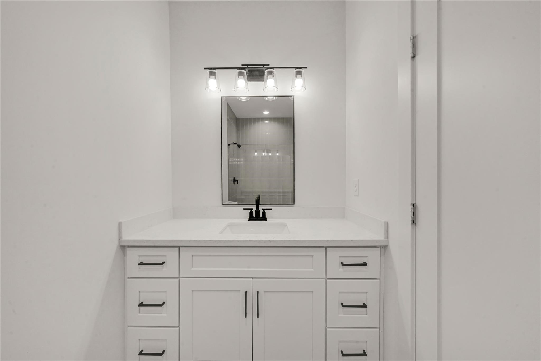 8402 Double, Unit B Houston, TX 77088 - Photo 13 of 21 a bathroom with a sink and a mirror
