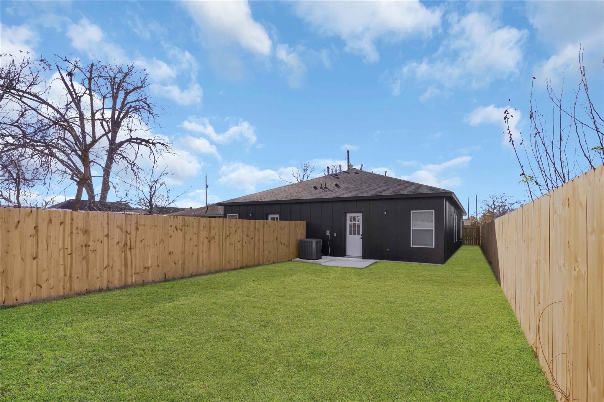 8402 Double, Unit B Houston, TX 77088 - Photo 21 of 21 a view of a large house with a big yard