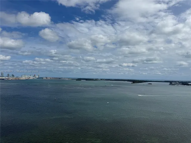 a view of balcony with a potted plants