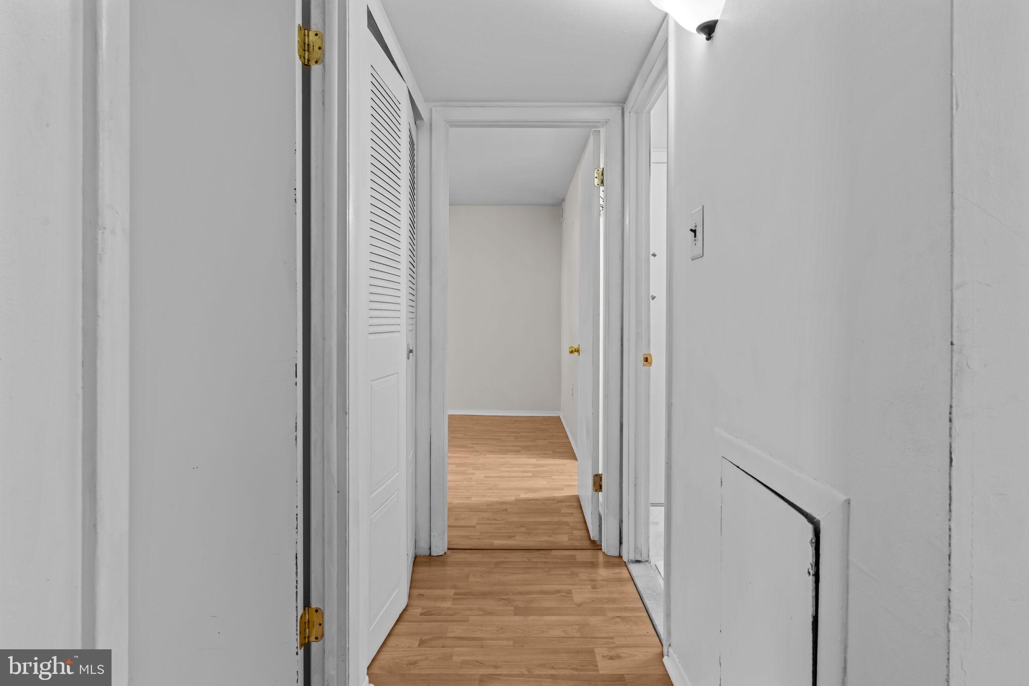 3750 Clarendon Avenue, Unit 3 Philadelphia, PA 19114 - Photo 12 of 20 a view of a hallway with wooden floor