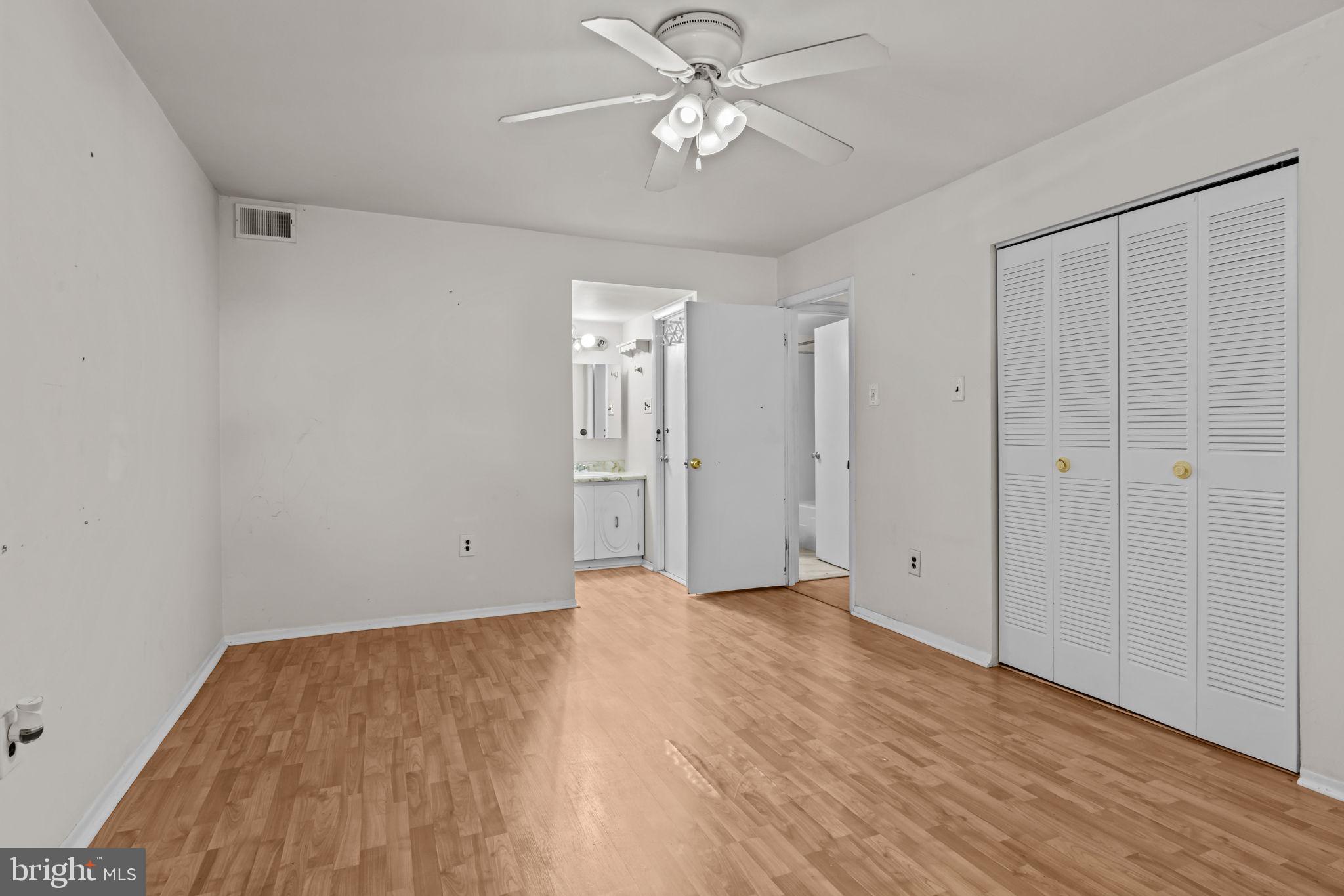 3750 Clarendon Avenue, Unit 3 Philadelphia, PA 19114 - Photo 17 of 20 a view of an empty room with wooden floor