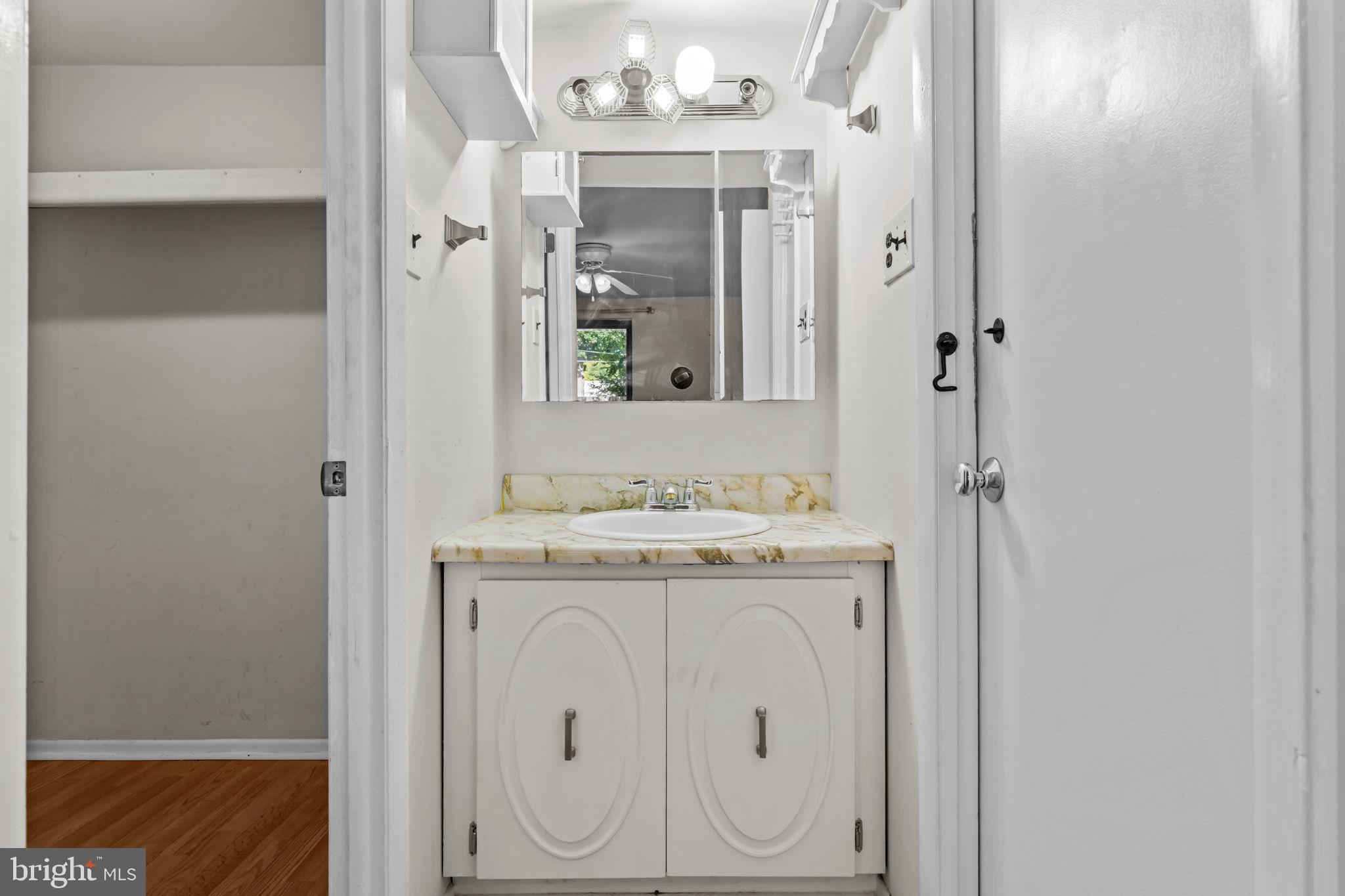 3750 Clarendon Avenue, Unit 3 Philadelphia, PA 19114 - Photo 18 of 20 a view of a hallway with washer and dryer