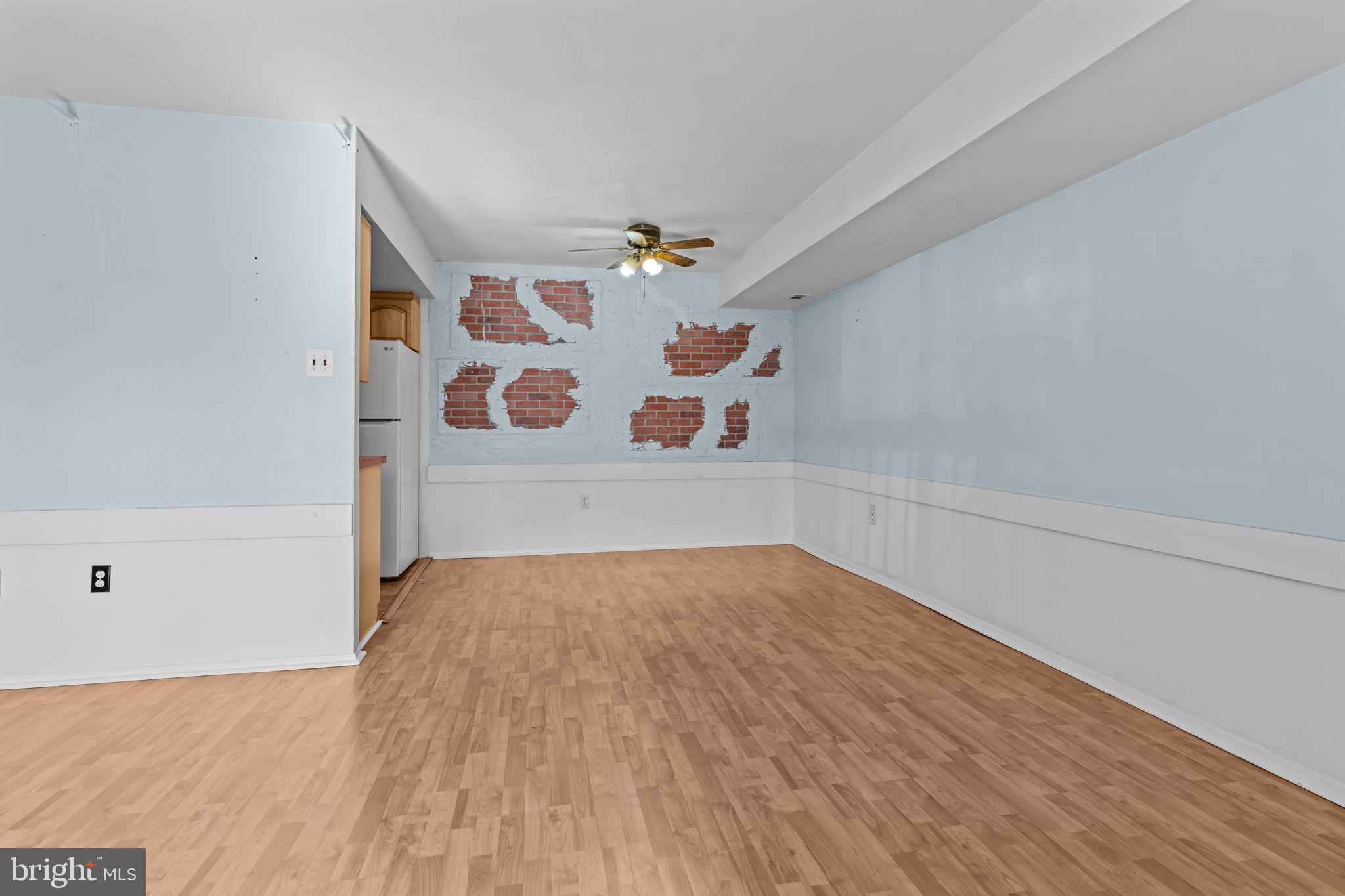 3750 Clarendon Avenue, Unit 3 Philadelphia, PA 19114 - Photo 5 of 20 wooden floor in a hall with an entryway