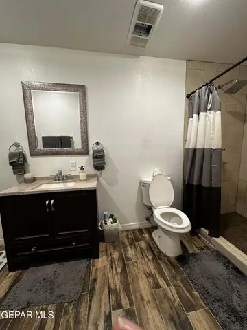 a view of a balcony with an ocean view