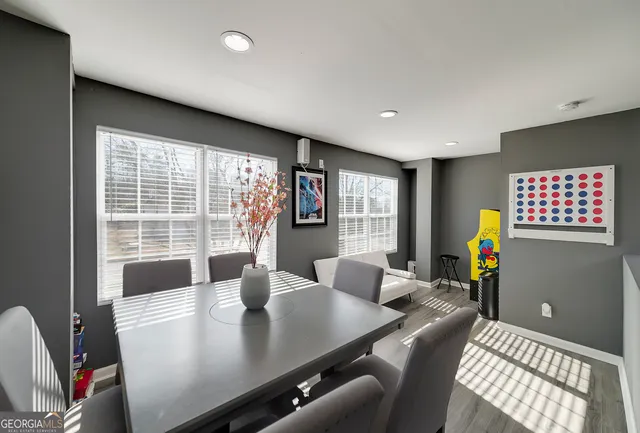 a view of a dining room with furniture window and outside view