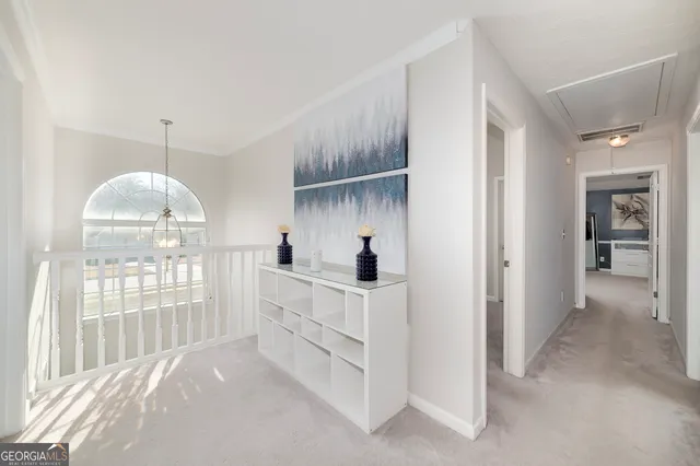 a view of kitchen with furniture and large window