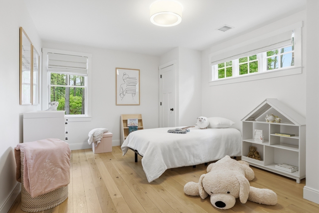 136 Holden Wood Road Concord, MA 01742 - Photo 16 of 31 a bedroom with two beds and a window