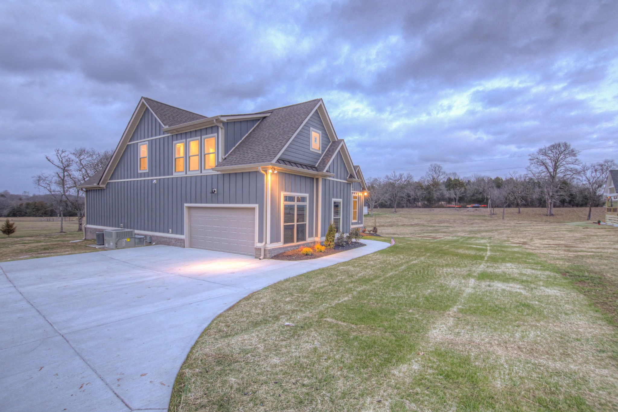 2575 Tracy Road Watertown, TN 37184 - Photo 1 of 23 a front view of house with yard and trees in the background