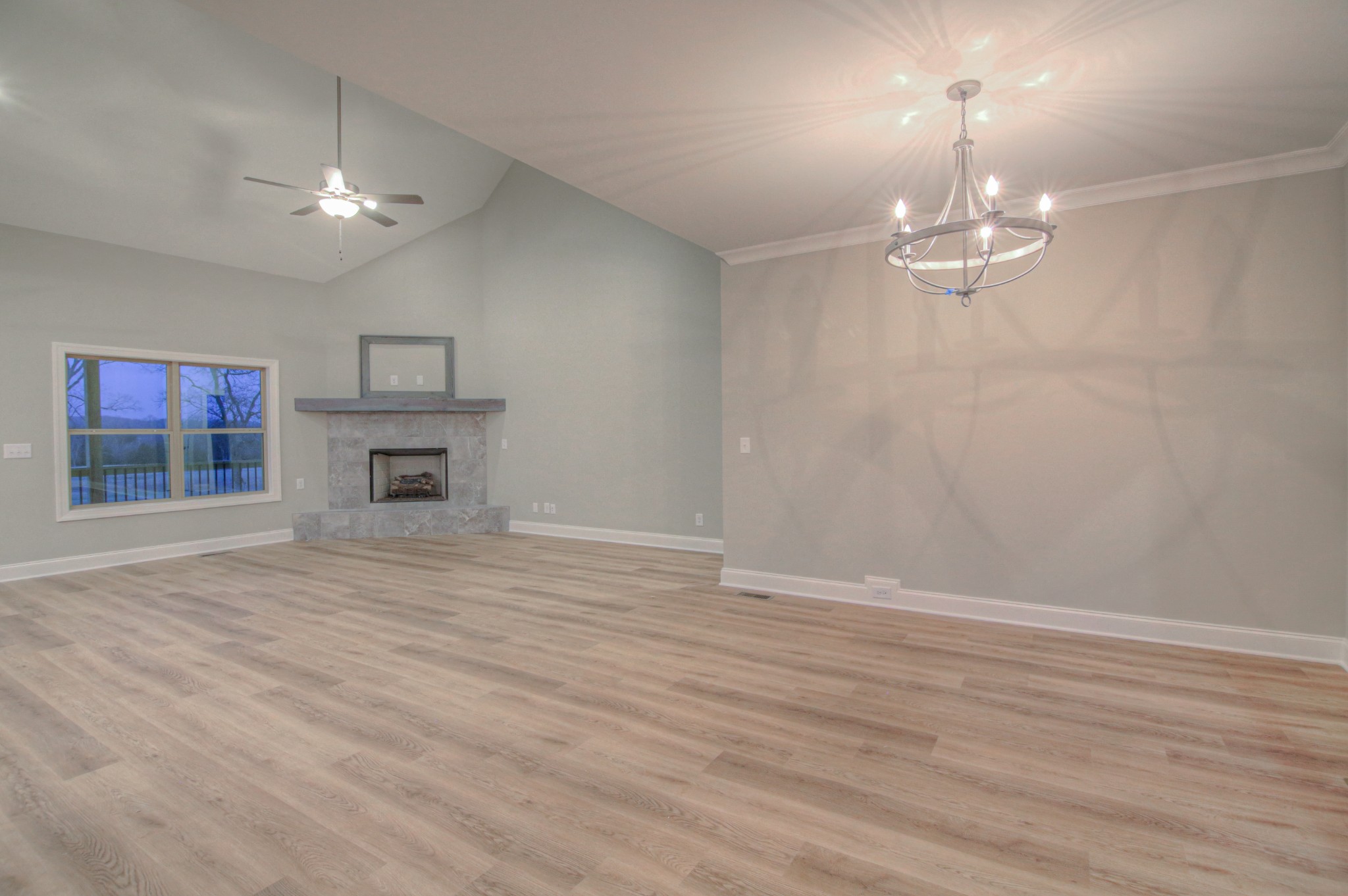 2575 Tracy Road Watertown, TN 37184 - Photo 3 of 23 a view of empty room with wooden floor and kitchen view