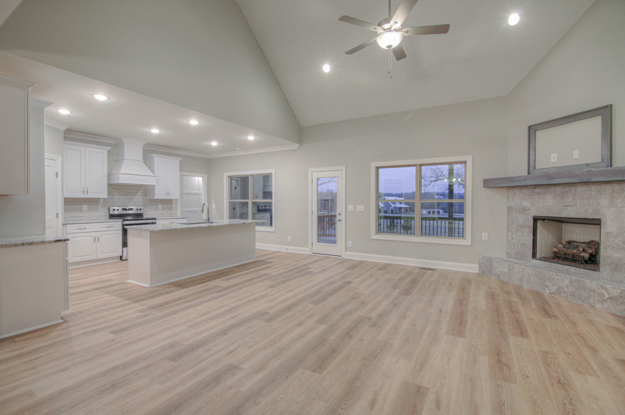 2575 Tracy Road Watertown, TN 37184 - Photo 4 of 23 a view of kitchen with kitchen island wooden floor center island and stainless steel appliances