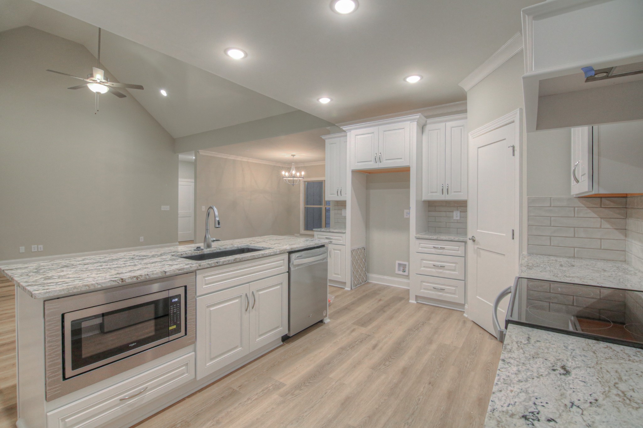 2575 Tracy Road Watertown, TN 37184 - Photo 8 of 23 a large kitchen with a stove and a sink