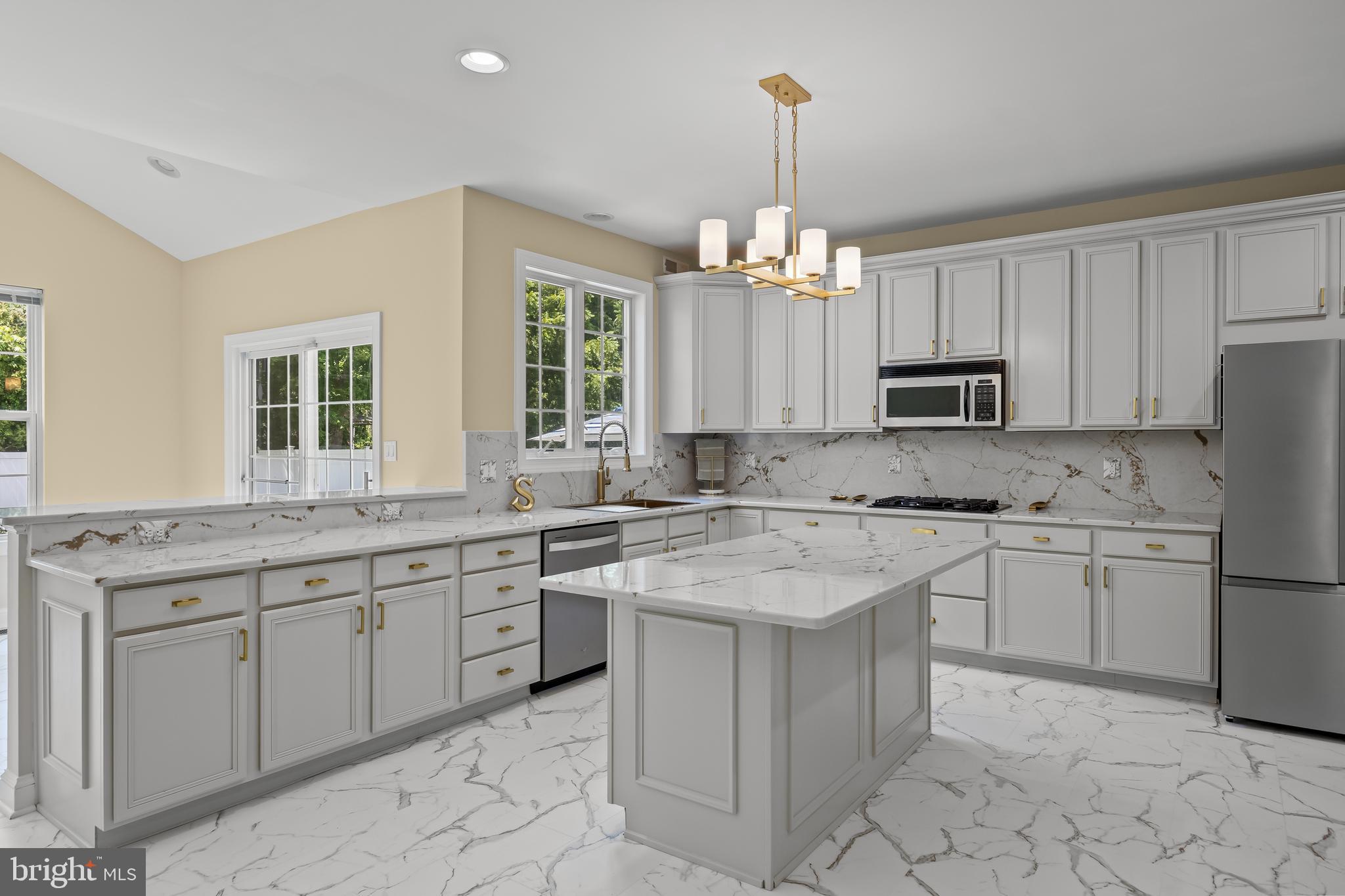 54 Jasmine Road Lumberton, NJ 08048 - Photo 11 of 60 a kitchen with a sink stove and microwave